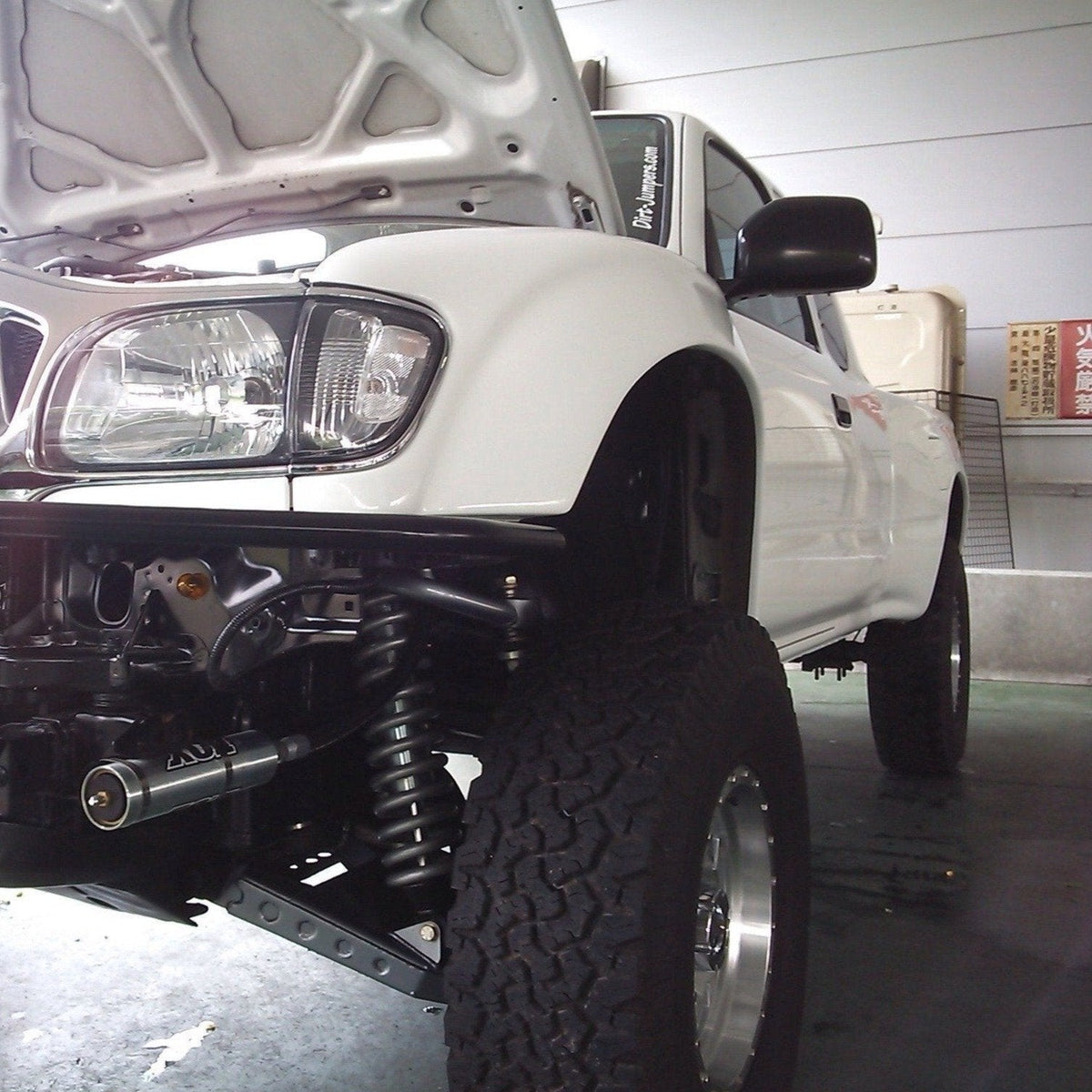 Toyota Tacoma with Fiberglass Fenders and long travel suspension